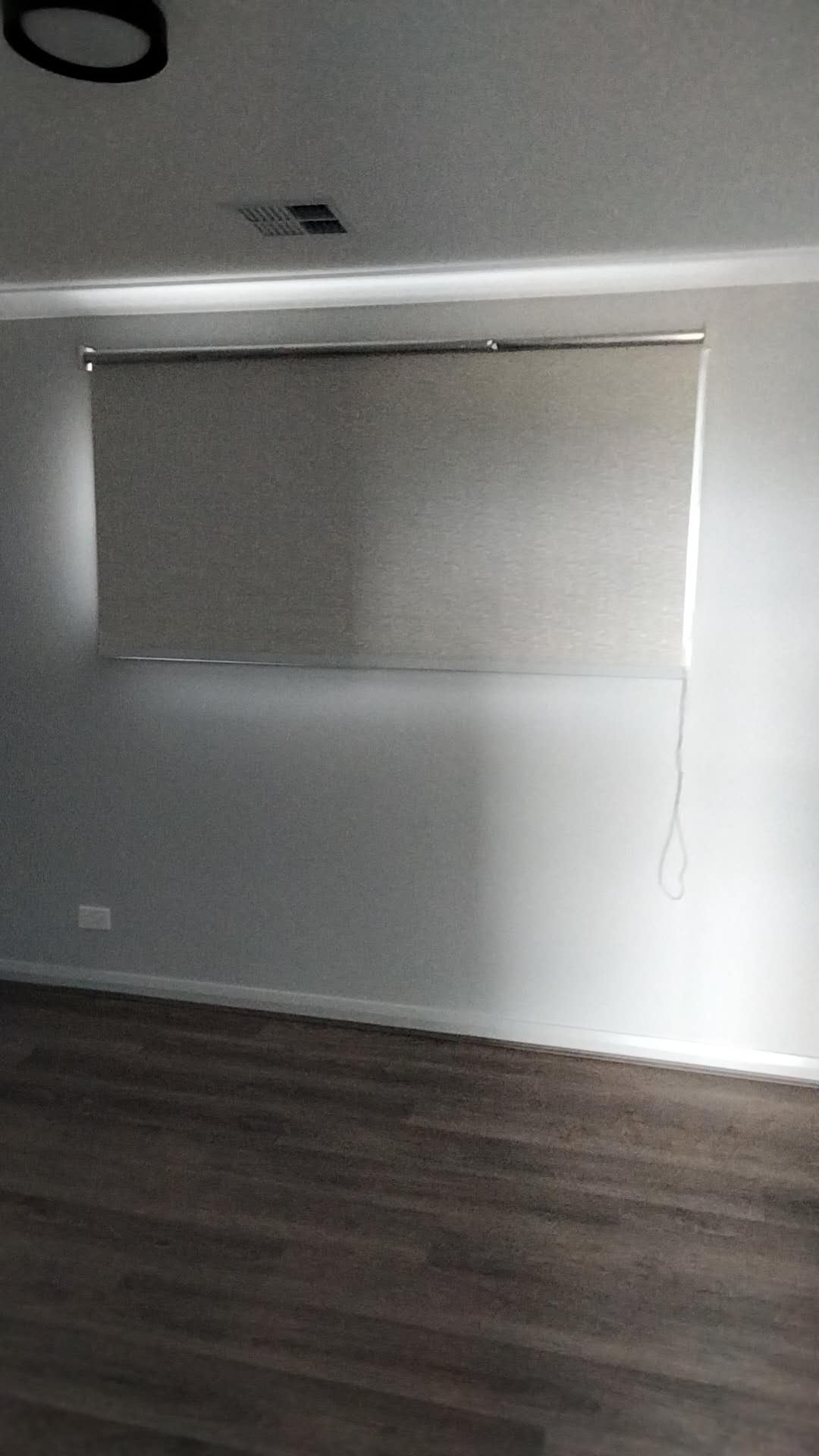 Ellis Services light-toned roller blind installation